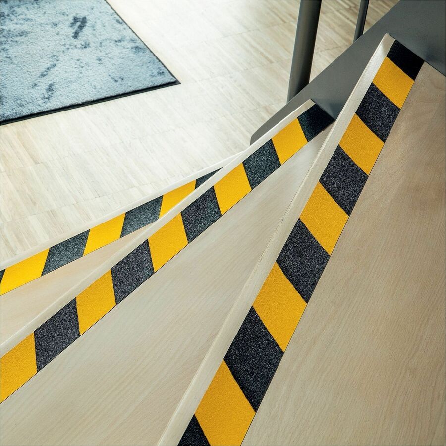 Durable self-adhesive standard hazard anti-slip tape for improving safety on floors, stairs and covered outdoor areas - 1085130