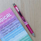 Pentel EnerGel Retractable Gel Roller, (0.7mm) Metal Tip, Pink Ribbon Barrel, Black Ink - BL77P-ABC